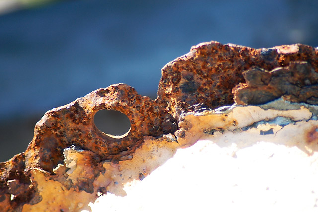 Rust Holes II © Dennis Mojado