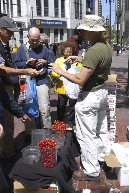 Selling Cherries on Market St. © Dennis Mojado